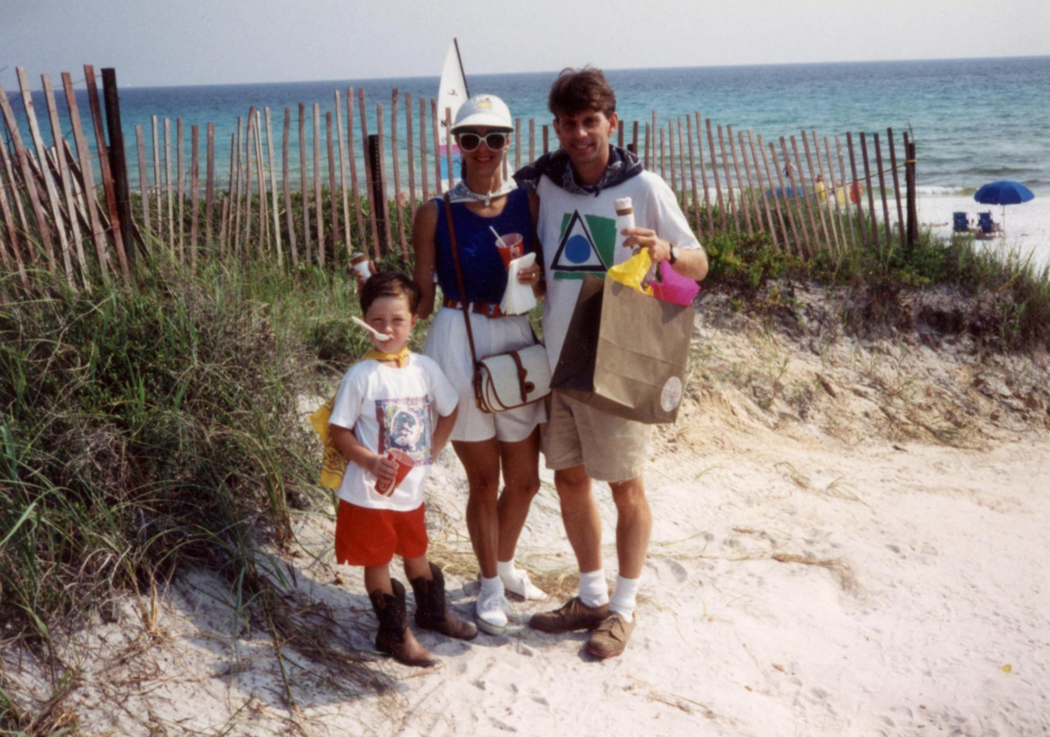 a sassy kid at the beach in the 90s